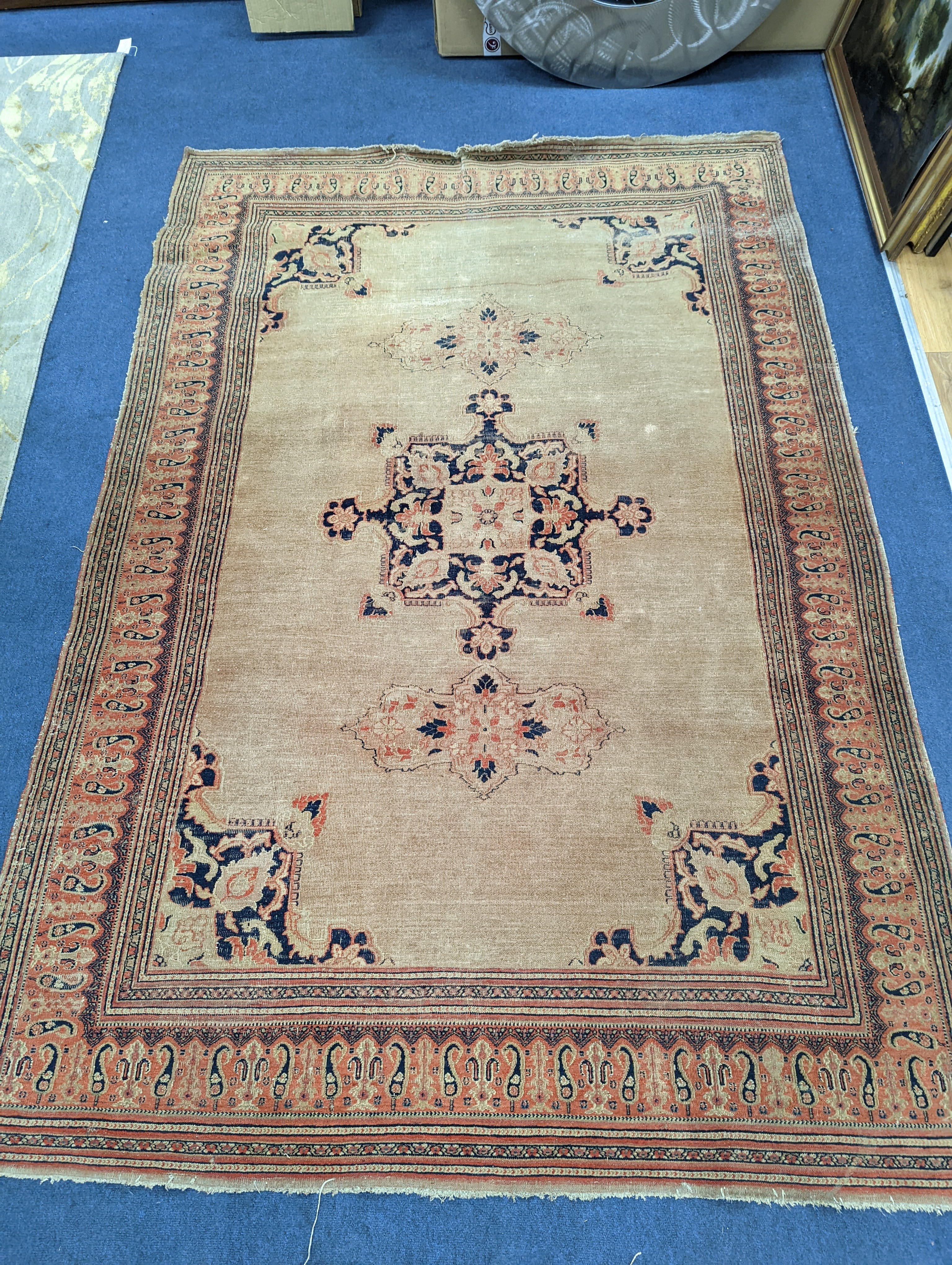 Three antique rugs, Caucasian and North West Persian, largest 230 x 154cm